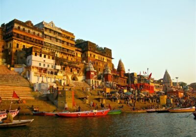 Ahilya Ghat and boats on the Ganga at Varanasi in golden evening light