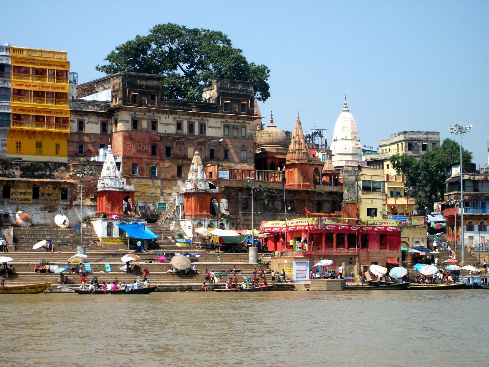 Golden morning light over the ghats and temples of Varanasi's riverfront