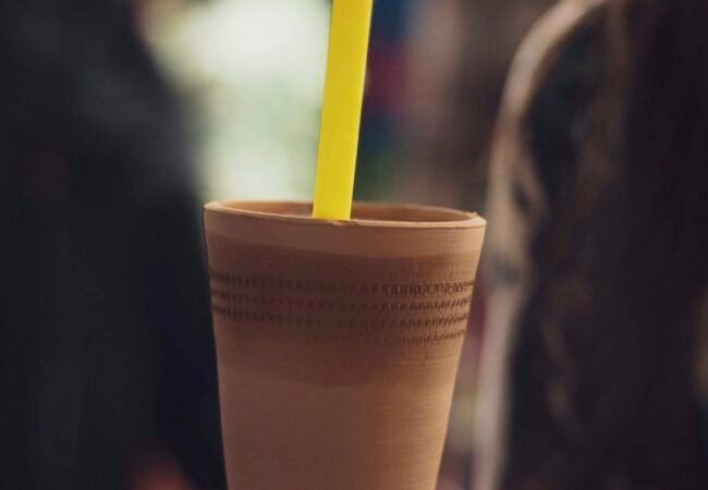 Lassi served in a traditional clay cup