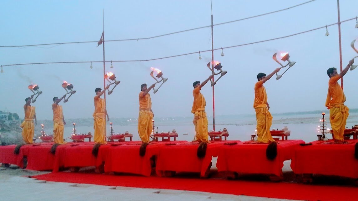 Priests performing the dawn Ganga Aarti at Assi Ghat, Varanasi
