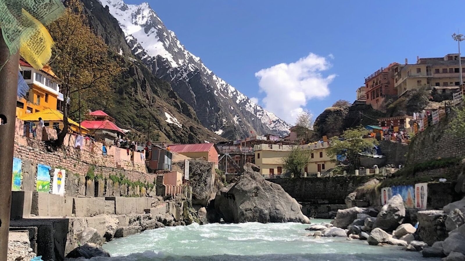 Badrinath town on the Alaknanda river below snow-capped Himalayan peaks, Uttarakhand