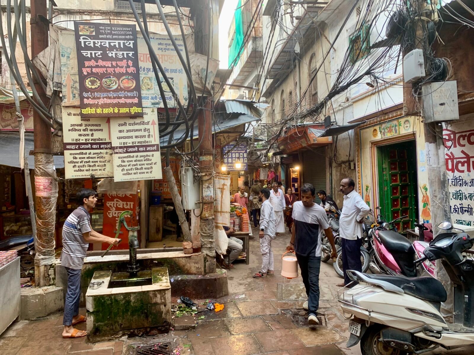 A narrow lane in Varanasi leading towards the ghats, where vehicles often cannot reach